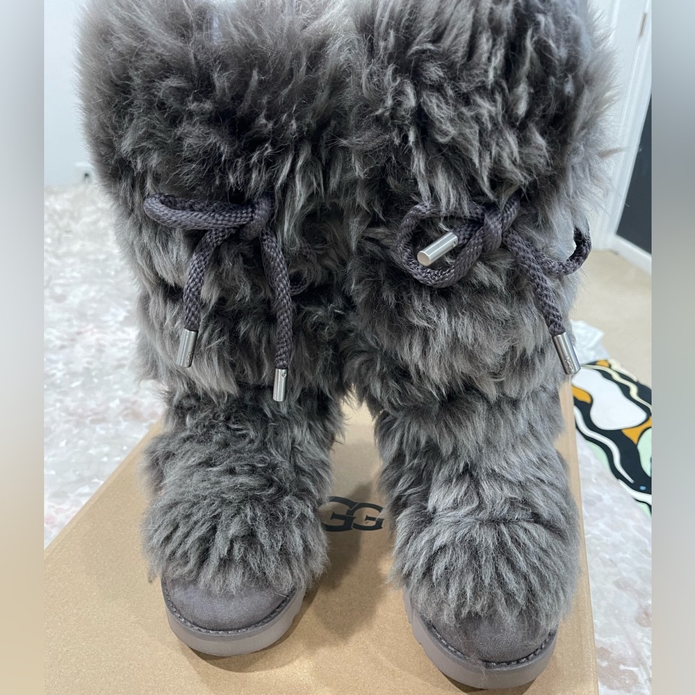 Grey faux fur UGG boots.